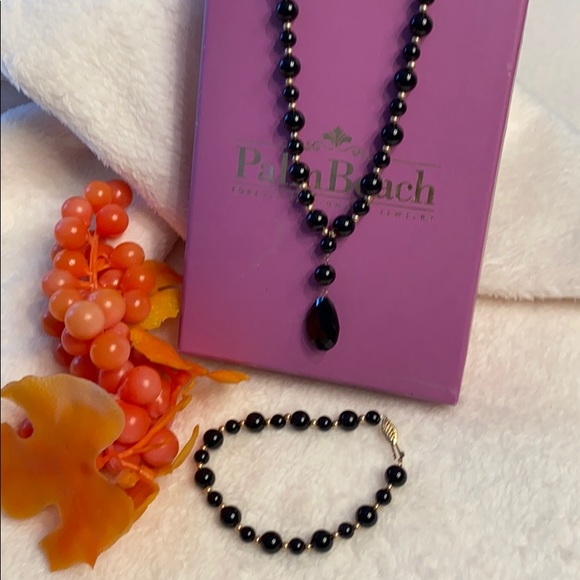 10k gold and genuine onyx necklace and bracelet set.